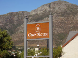 Wooden Guesthouse Sign