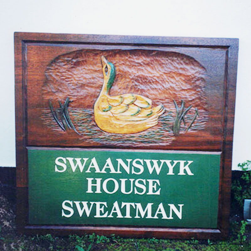 guest house wooden sign